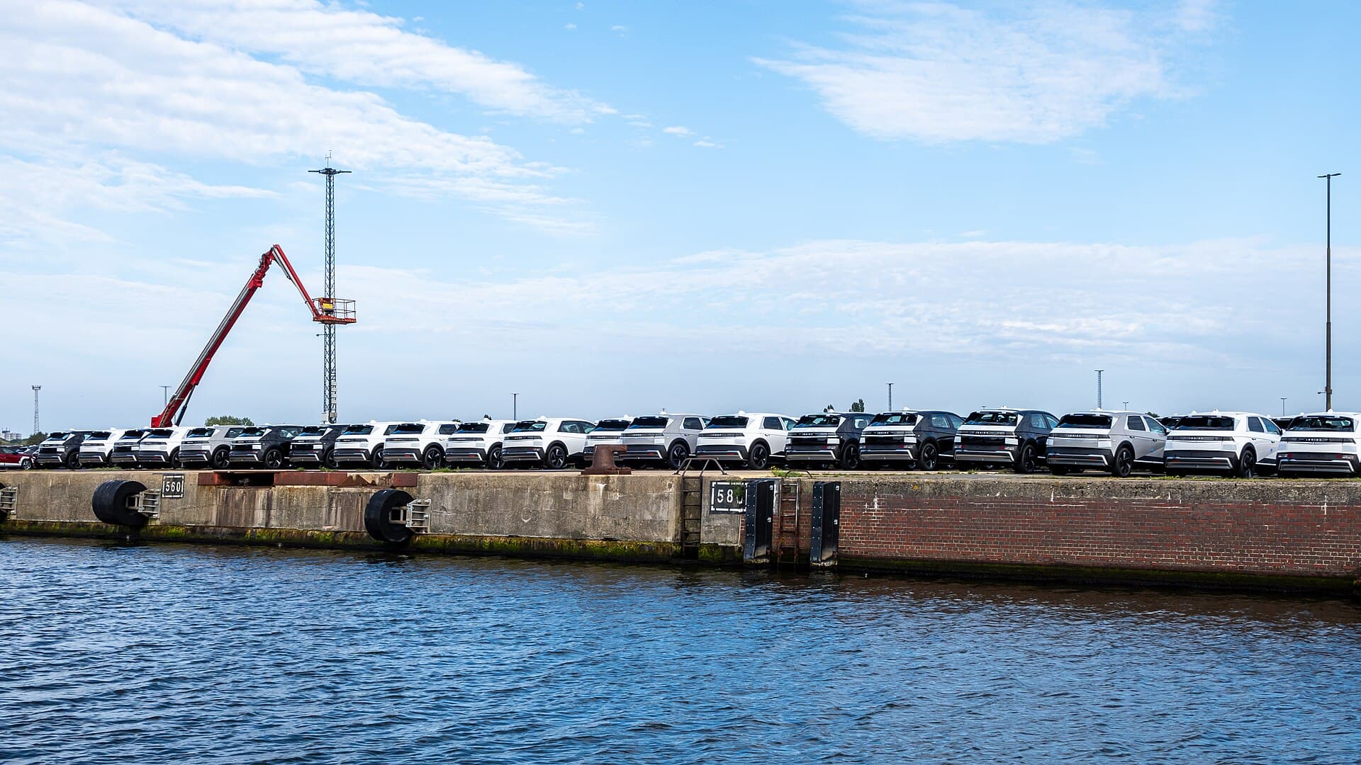 Cars lined up at port ready for shipping — vehicle logistics
